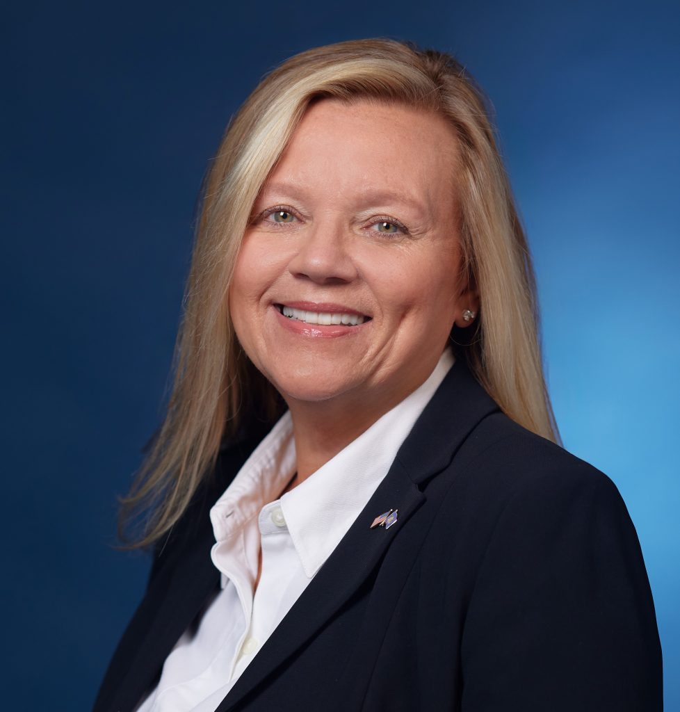 blonde woman in a suit